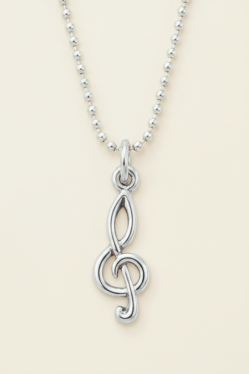 Silver-tone treble clef charm pendant on beaded chain with raised loop detail