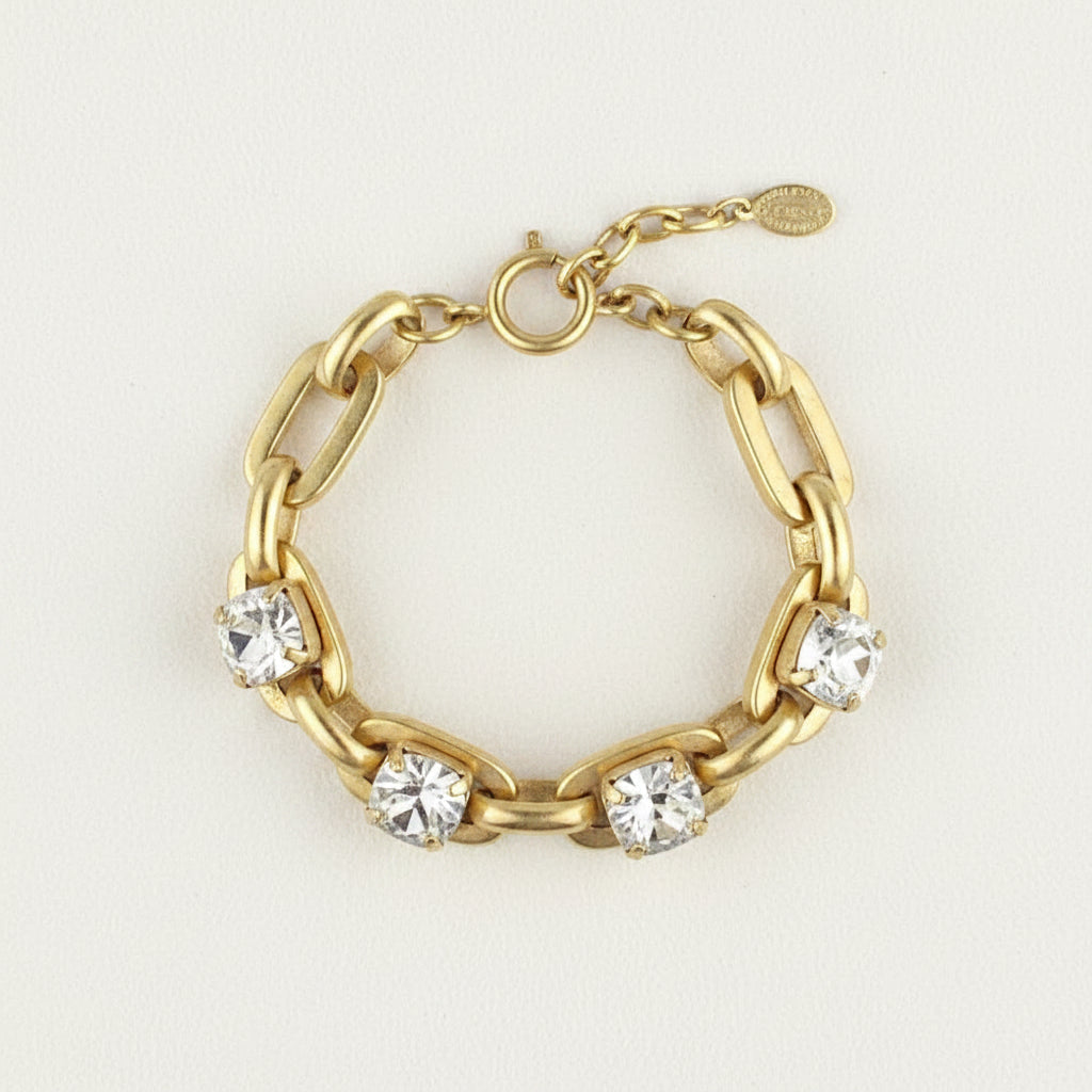 Gold-tone crystal link bracelet with five round clear stones