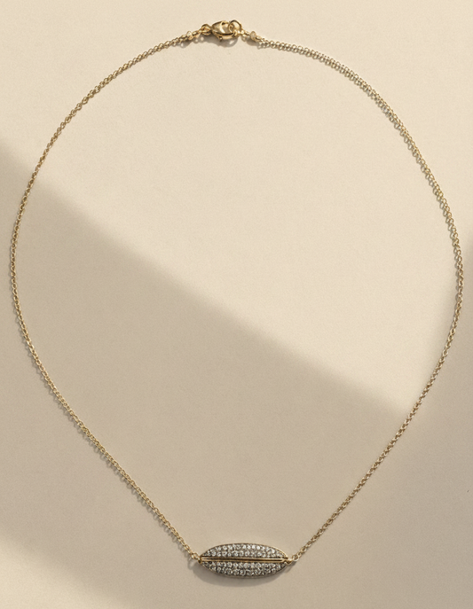 Gold necklace with pavé diamond ellipse pendant
