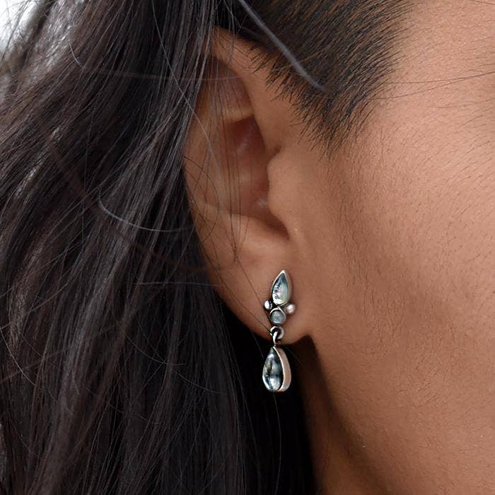 Silver drop earrings with blue-green teardrop stones