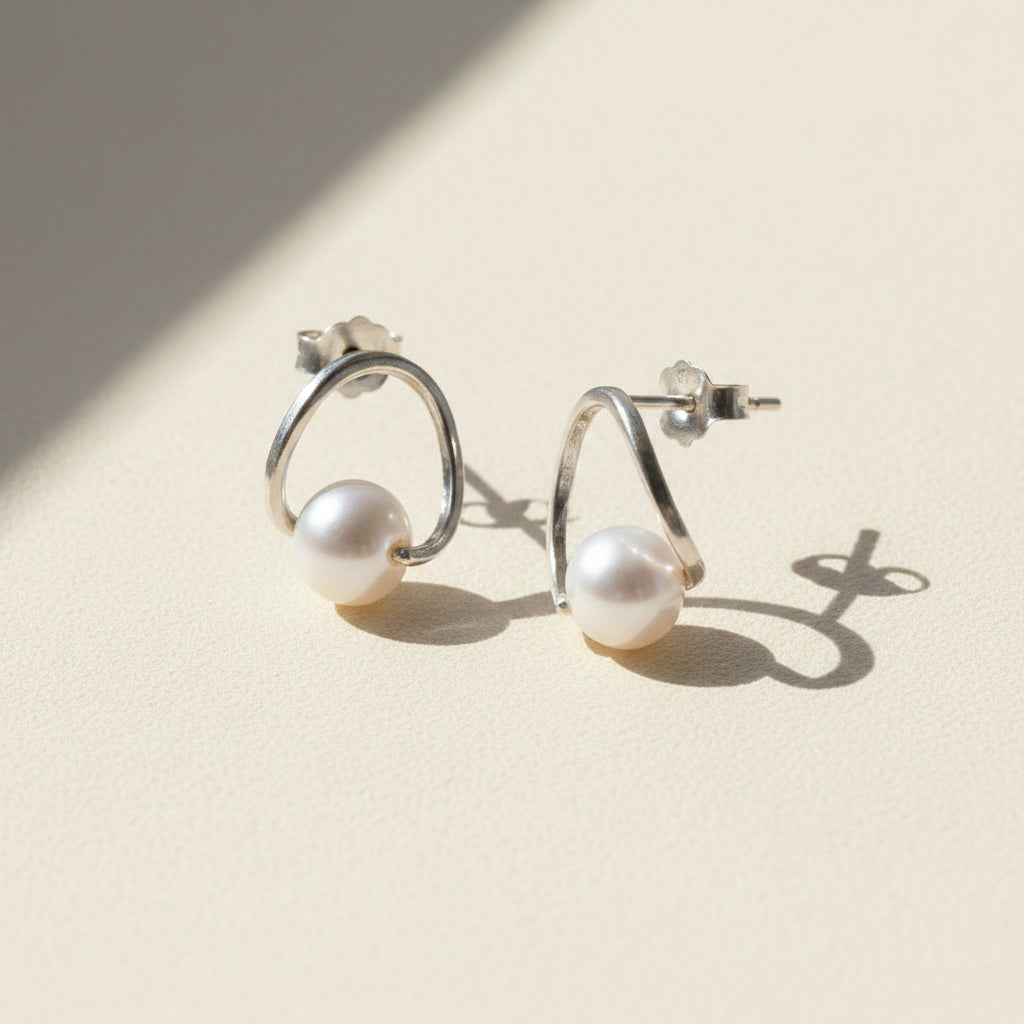 Silver-tone circle hoop earrings with white pearl drop studs