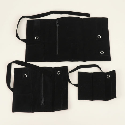 Black fabric bags with straps on a white background