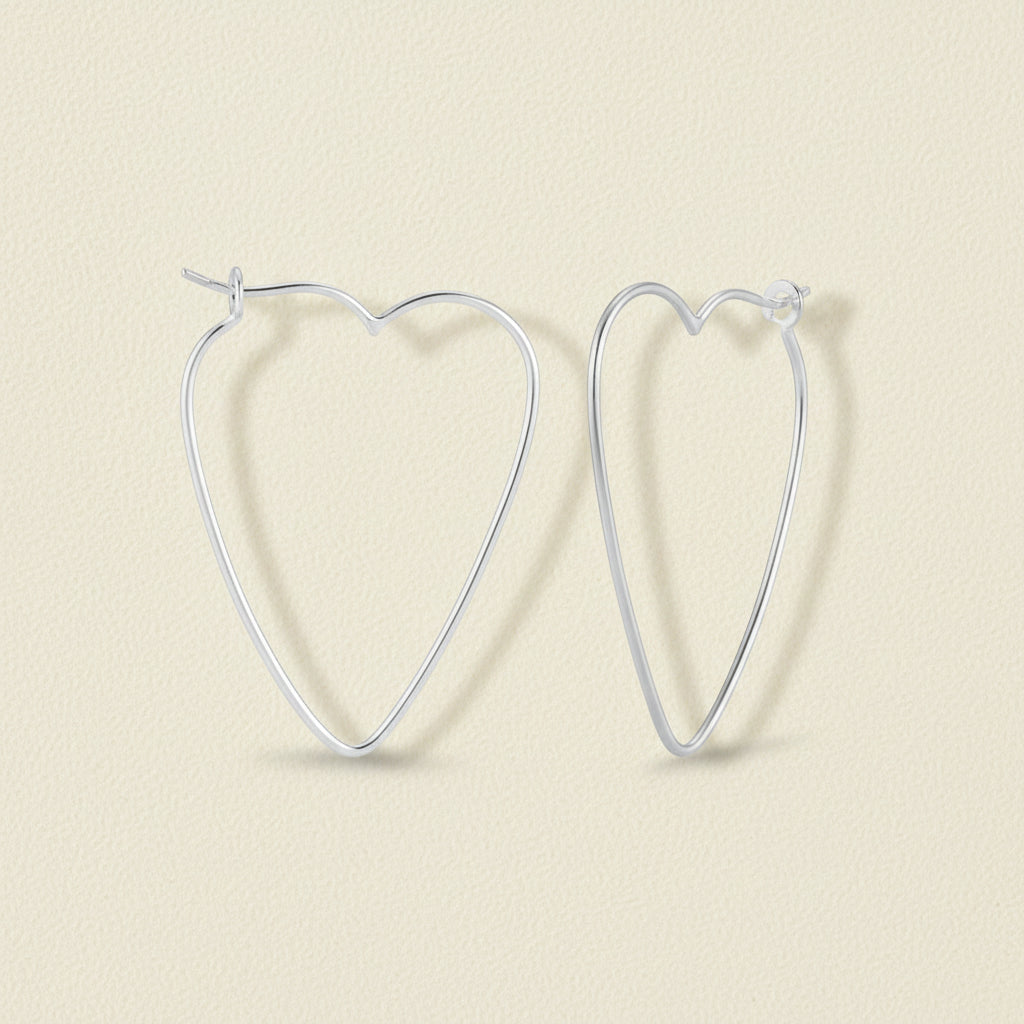 Heart-shaped wire hoop earrings, silver-tone, heart outline with stud closures