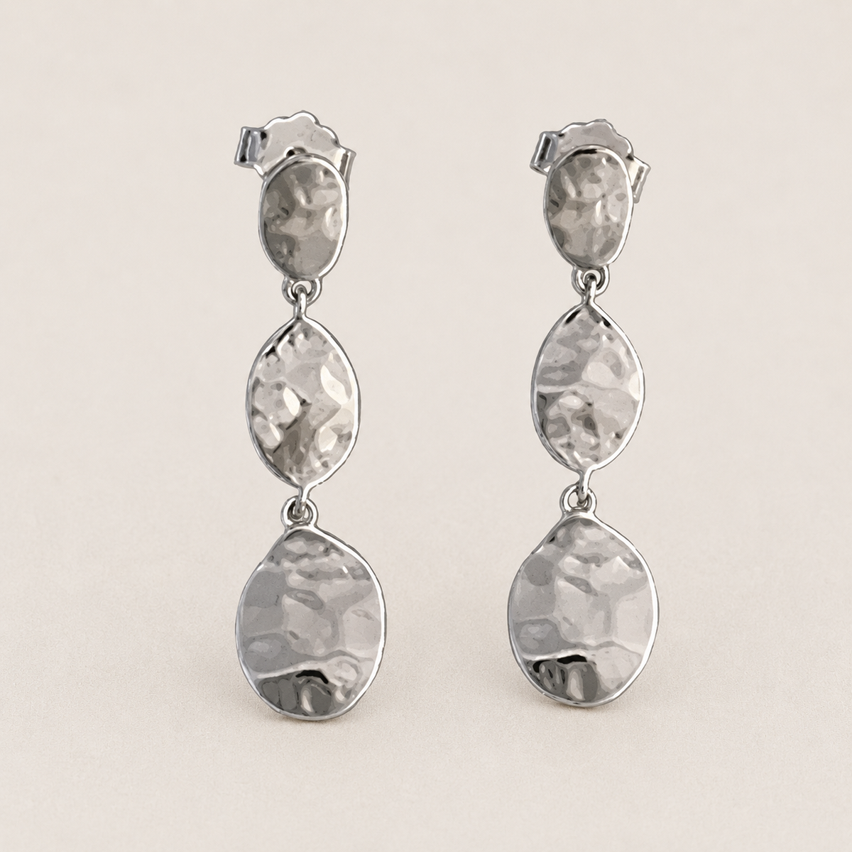 Triple drop post earrings with hammered silver-tone metal teardrops