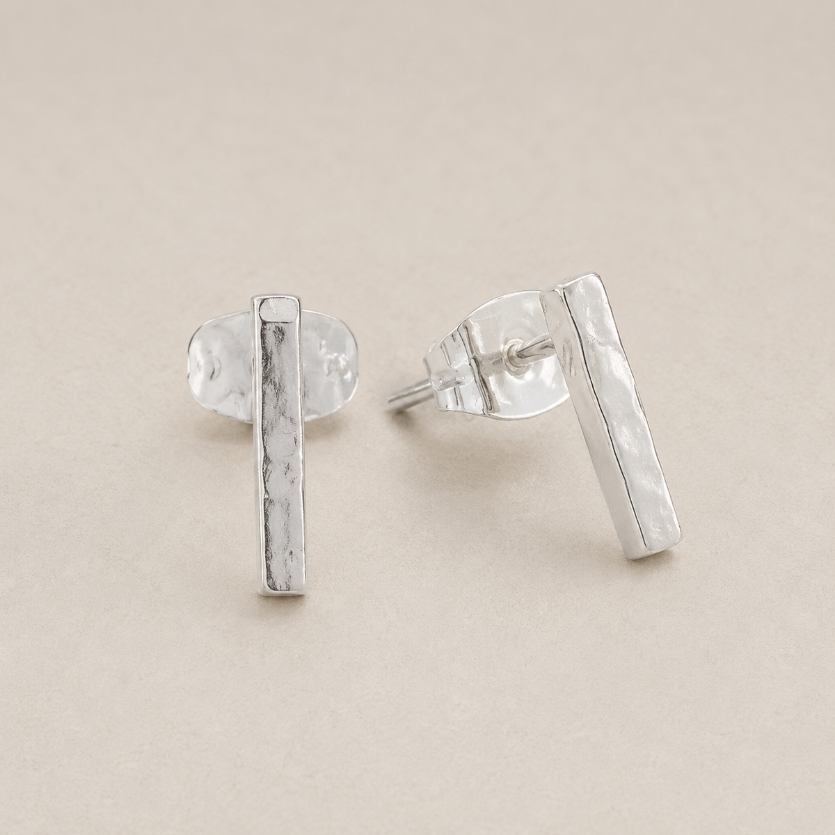 Hammered bar stud earrings, silver tone, with butterfly back closures