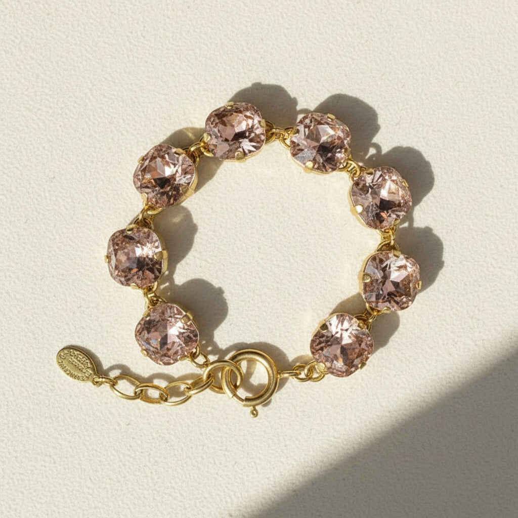 Blush beaded bracelet with gold heart clasp and link chain