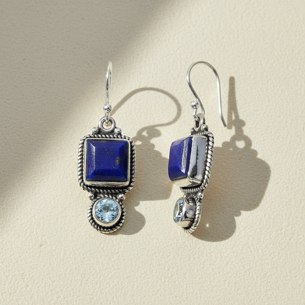 Pair of blue gemstone drop earrings: square stone with oval crystal, silver-tone