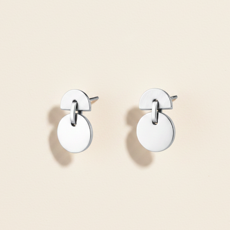 Silver-tone half moon and full moon stud earrings with circular drop charm