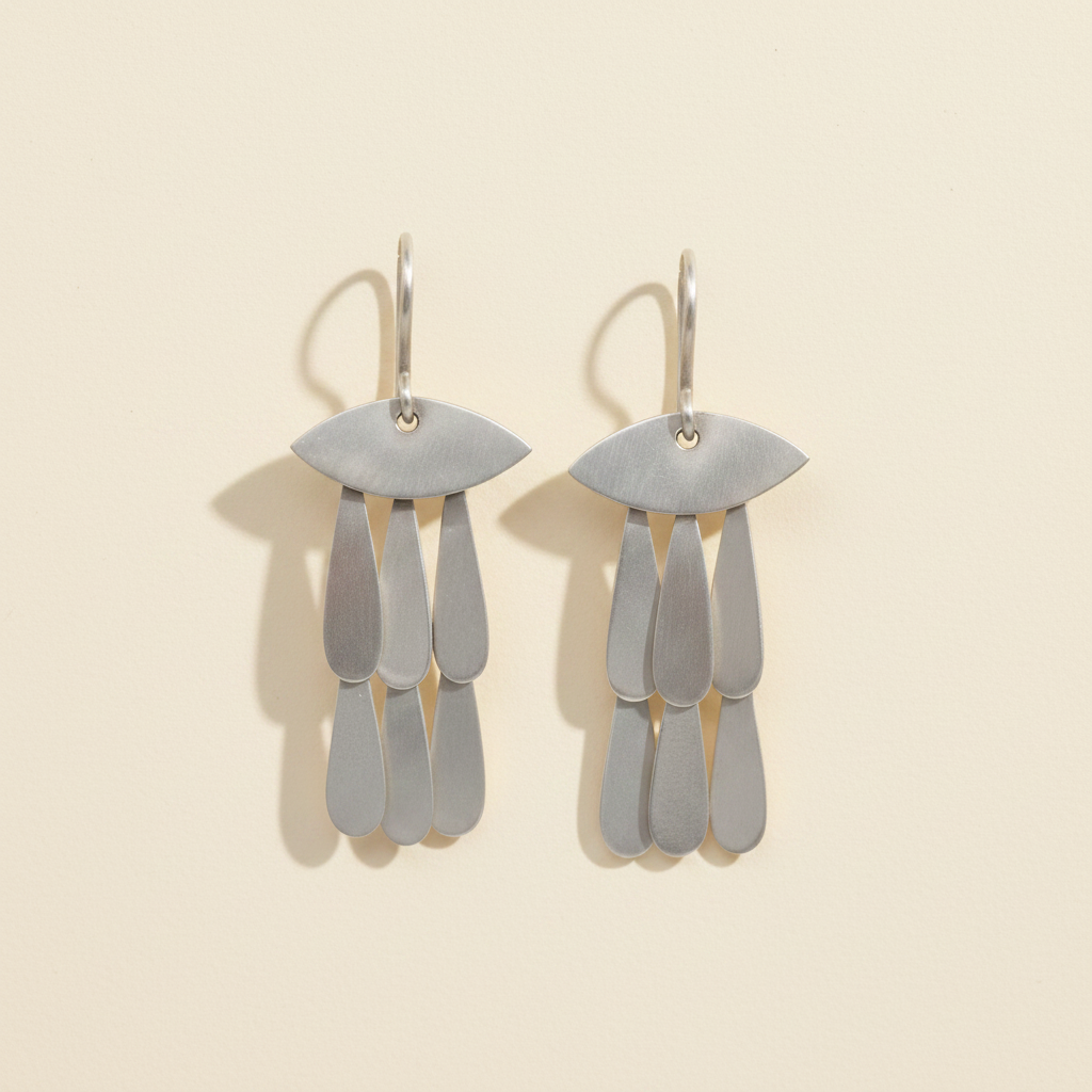 Gray teardrop chandelier earrings with layered eye-shaped drops