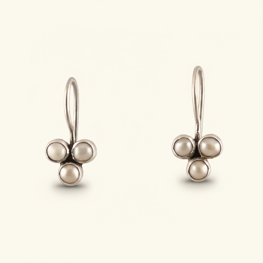 Silver-tone clover drop earrings with three white round pearls on lever hooks