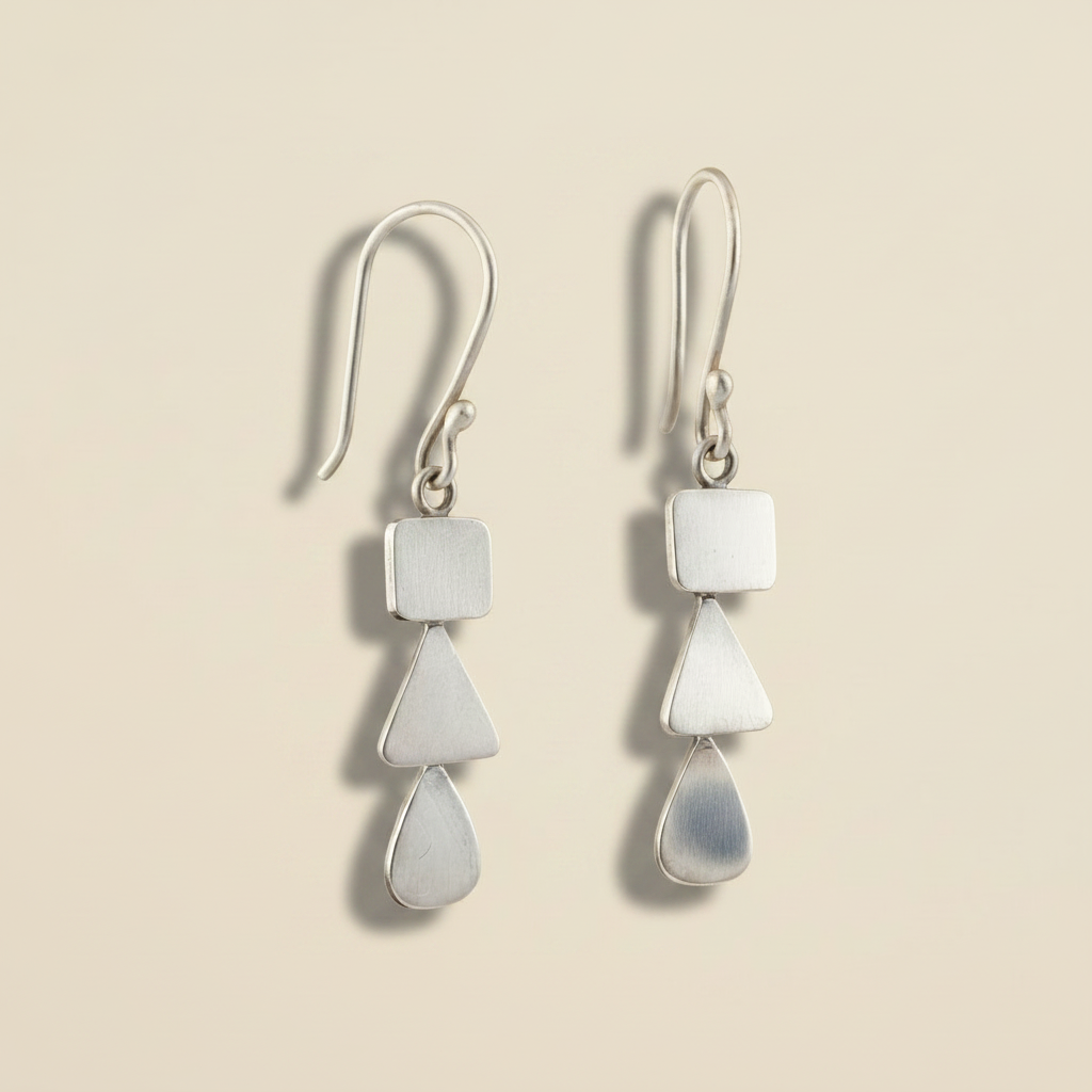 Silver-tone dangle earrings with square, stacked teardrop drops on lever hooks