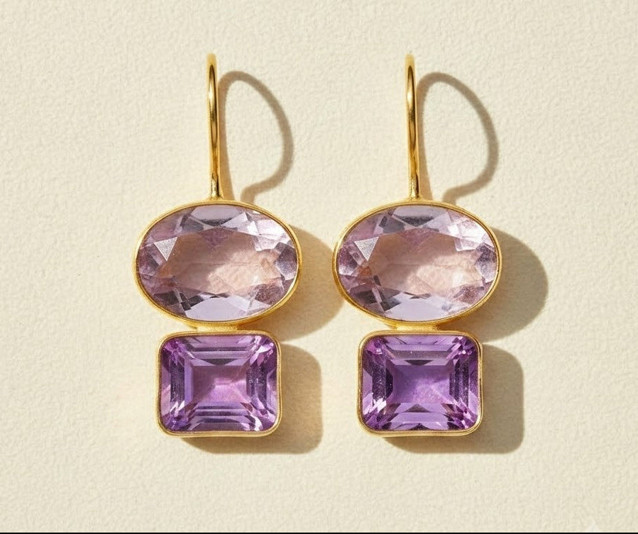 Gold-tone double drop earrings with amethyst-purple oval and square stones