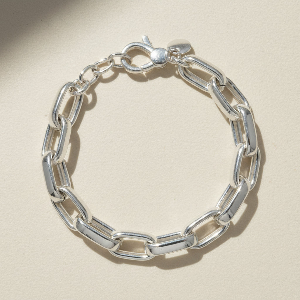 Silver chain bracelet on a white background