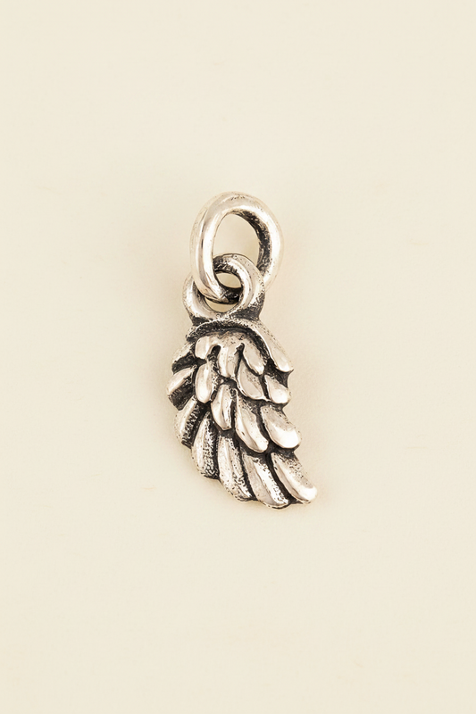 Silver wing charm pendant with circular bail
