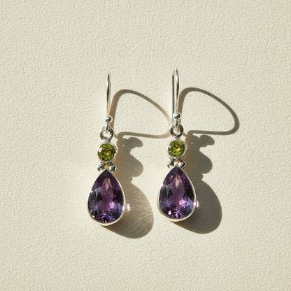 Silver-tone teardrop dangle earrings with green round and purple amethyst gems
