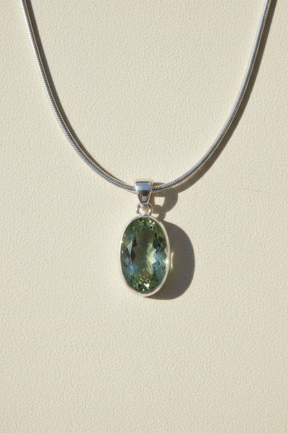 Silver chain pendant necklace with oval green amethyst stone