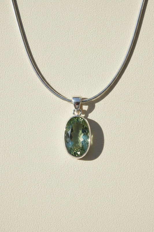 Silver chain pendant necklace with oval green amethyst stone