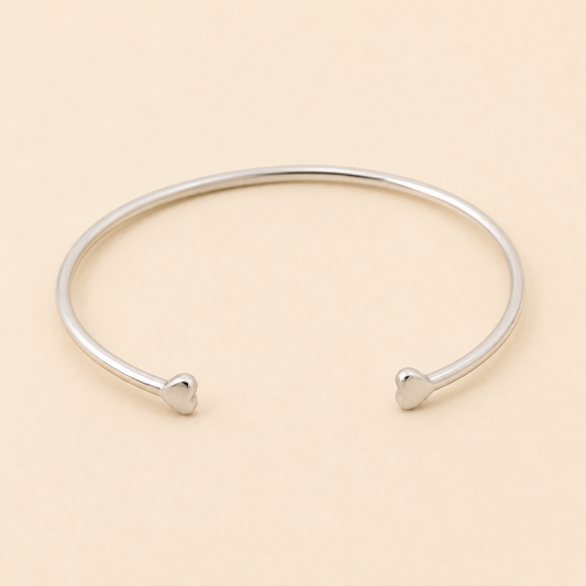Silver-tone double heart cuff bracelet with two heart-shaped ends