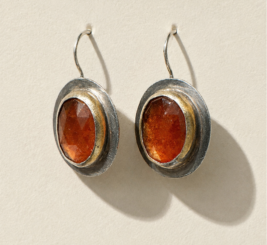Crescent-rim hook earrings with oval amber stone in silver-toned frame