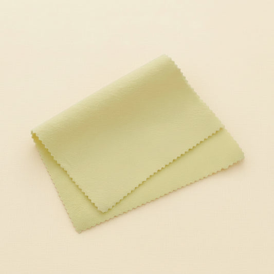 Lemon yellow jewelry polishing cloth, folded rectangle