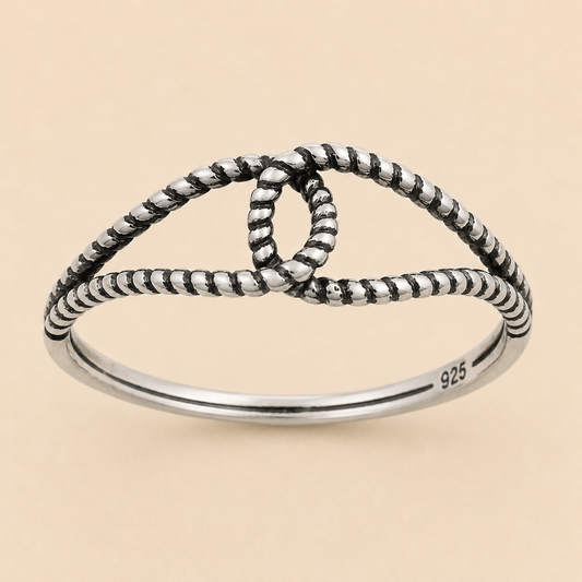 Oxidized knot ring with beaded design and 925 stamp on silver band
