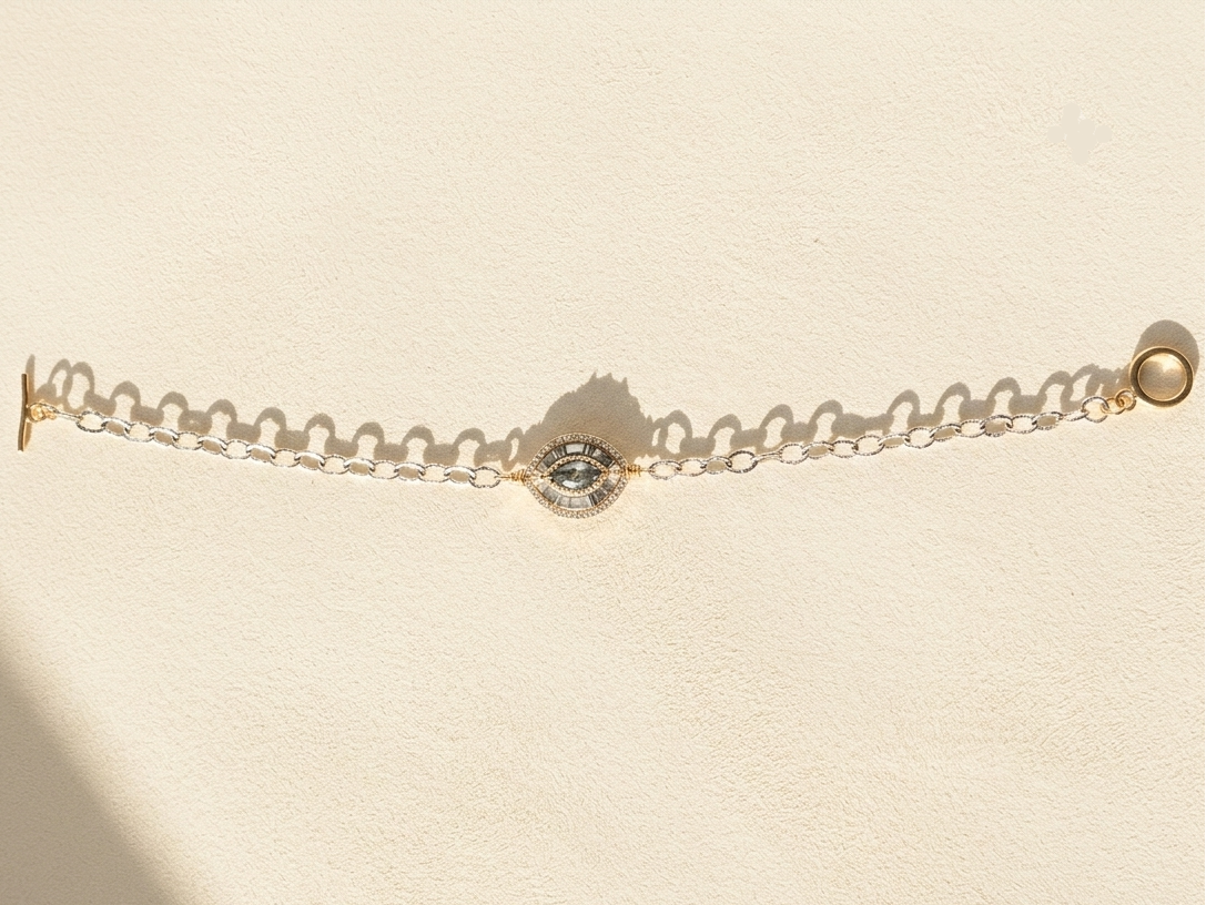 Medallion chain bracelet with small round center and round clasp extender