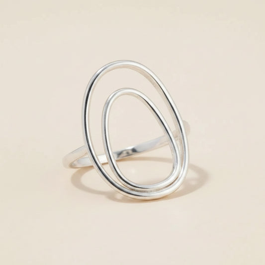 Silver double oval ring with two stacked teardrop-shaped bands
