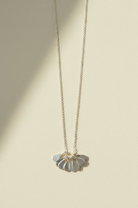 Silver teardrop flower pendant necklace with thin chain