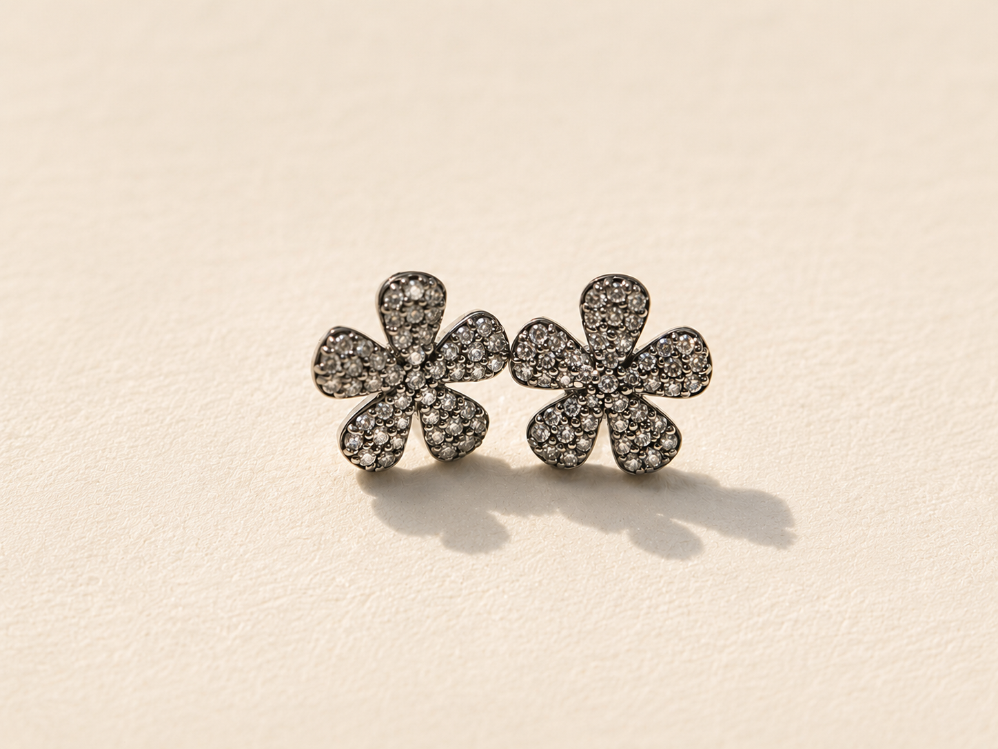Pavé diamond flower stud earrings, pair of floral studs