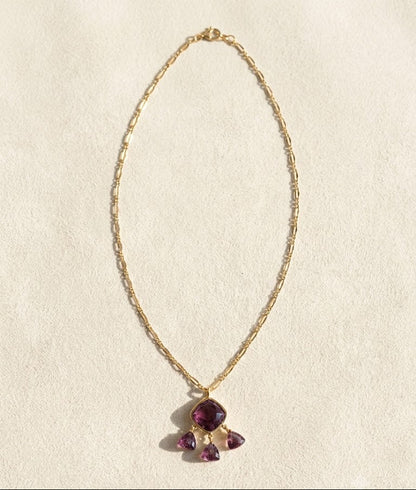 Gold-tone briolette necklace with teardrop purple gemstone pendant