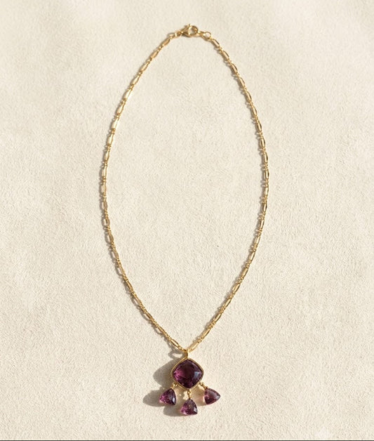 Gold-tone briolette necklace with teardrop purple gemstone pendant