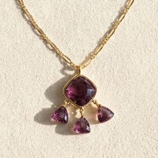 Gold-tone necklace pendant with purple teardrop briolette drops