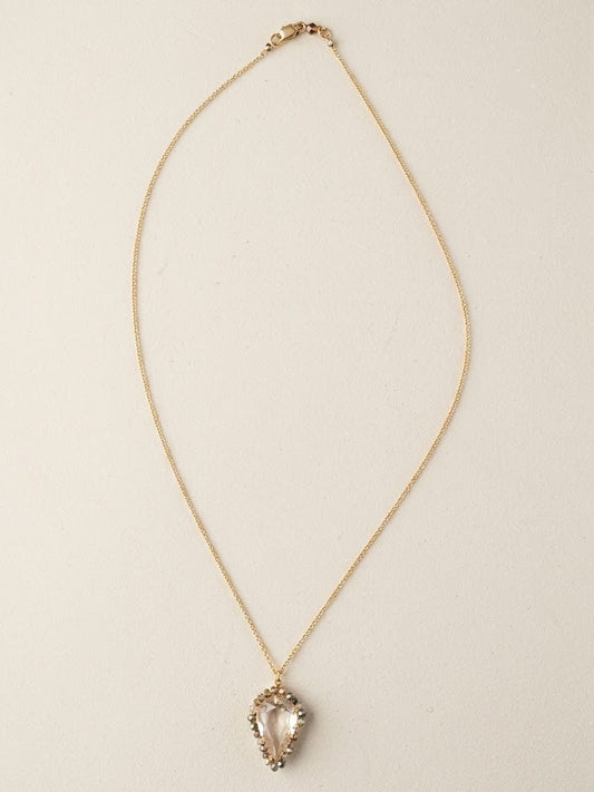 Gold-tone thin chain necklace with small heart teardrop pendant and clear stones