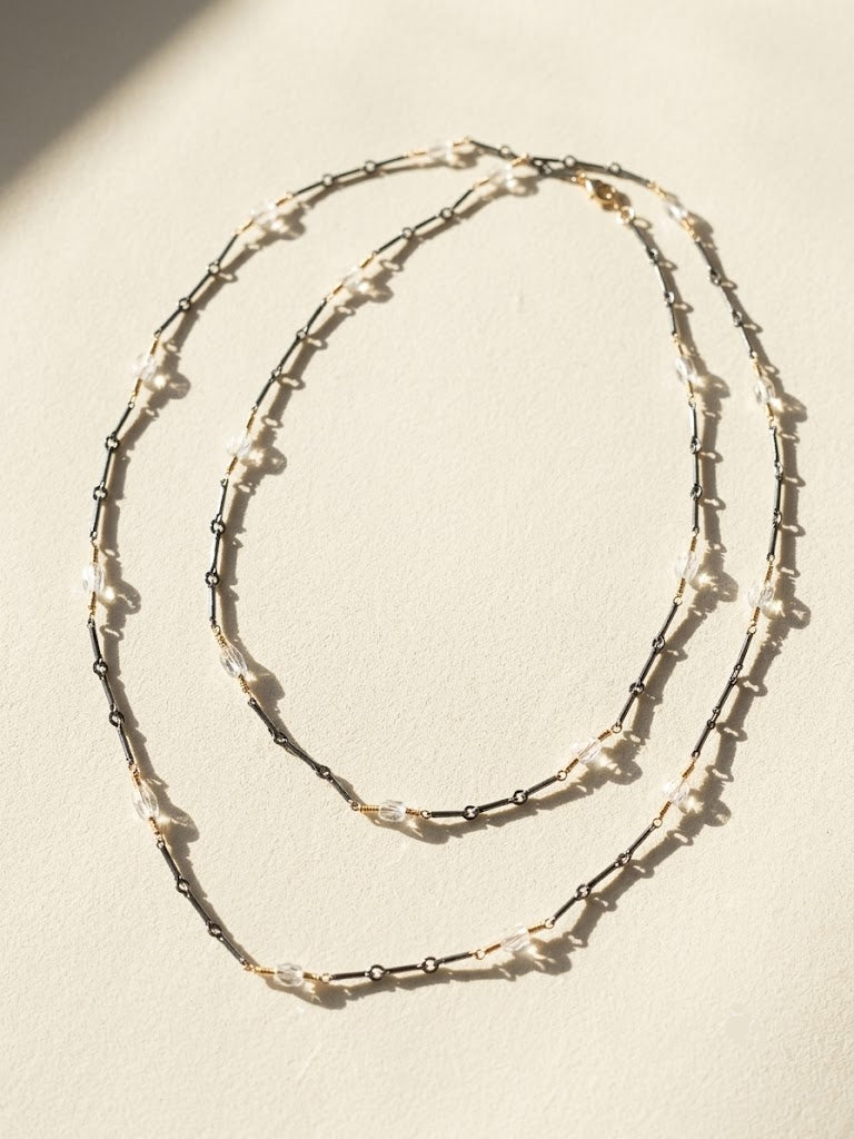 Long two-tone crystal chain necklace, double row with silver and dark beaded links