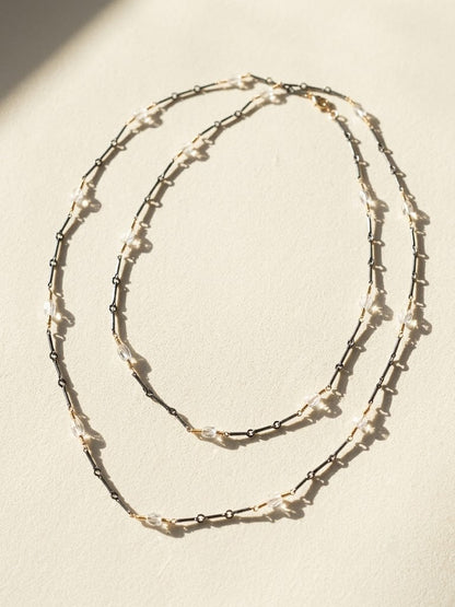 Long two-tone crystal chain necklace, double row with silver and dark beaded links