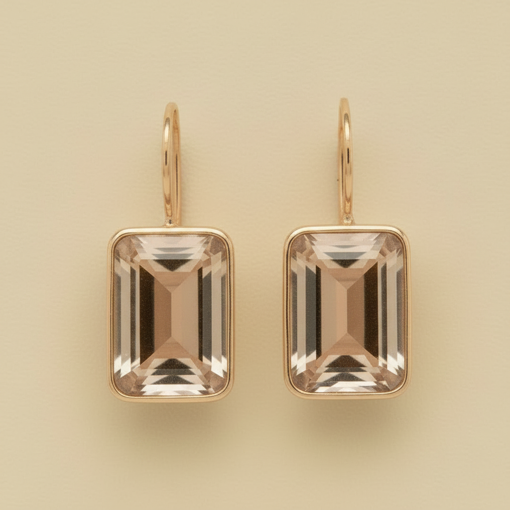Gold-tone emerald-cut earrings with large champagne square crystals and small hoop backs
