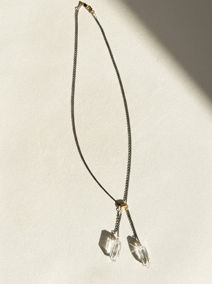 Two-tone crystal quartz lariat necklace with two faceted crystal drops