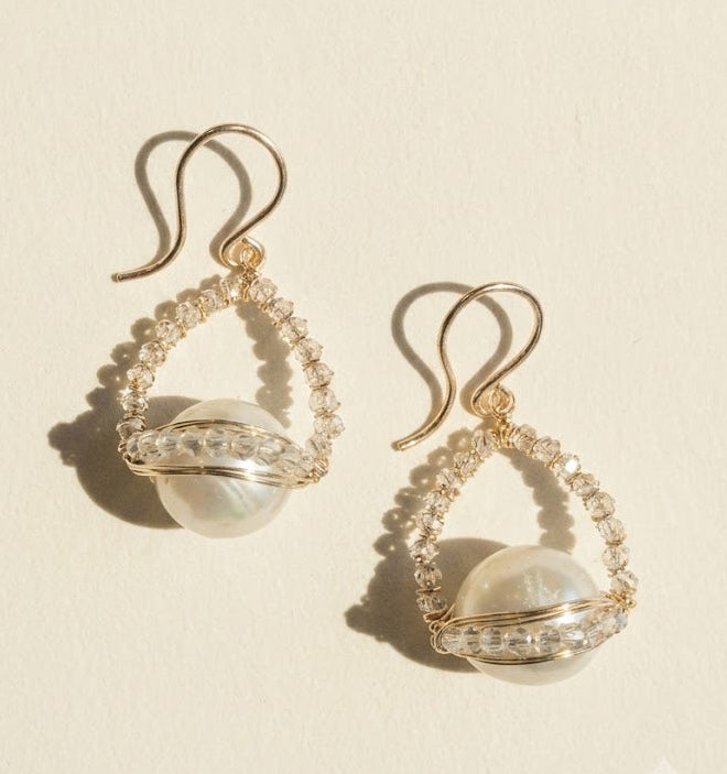 Gold-tone dangle earrings with crystal fringe and clear teardrop pearl drop