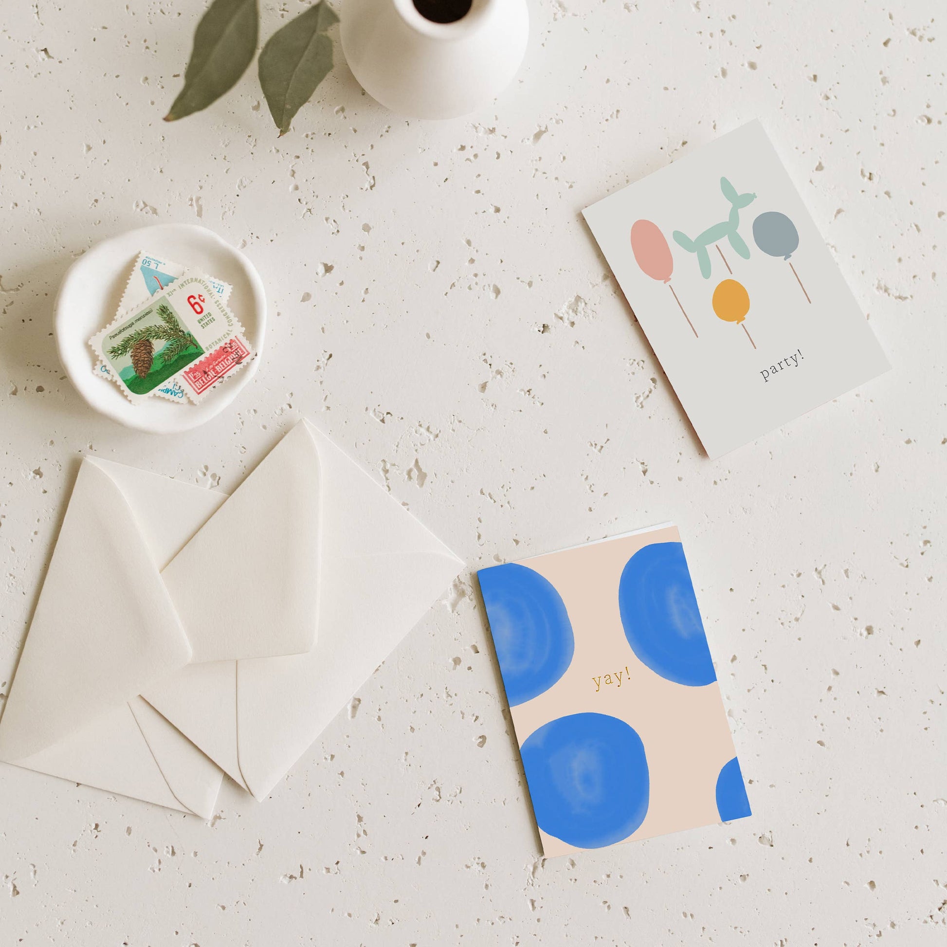 Blue dotted mini greeting card with 'yay!' text, corner and front shown