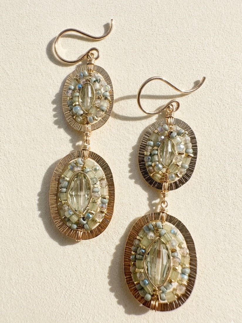 Gold-tone beaded drop earrings with oval faceted stones and hooked tops