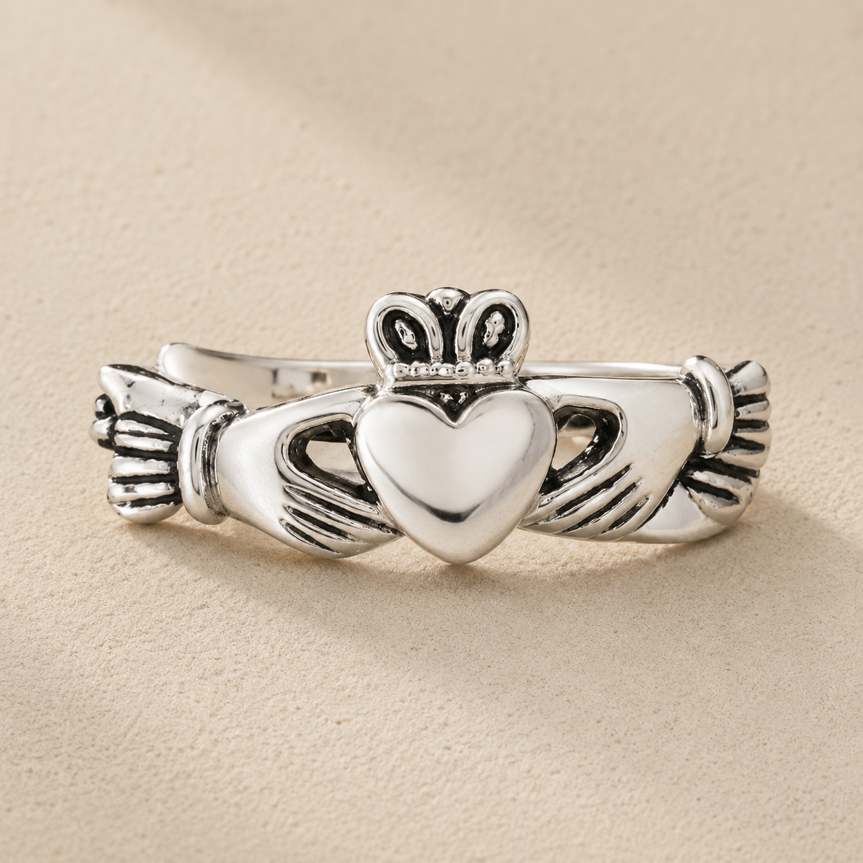 Silver mini heart Claddagh ring with two hands and crown detail