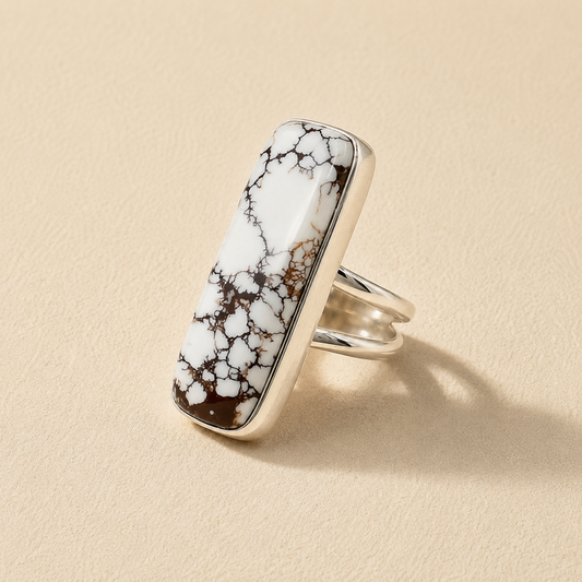White wild horse jasper ring with dark veined stone, open-back silver band