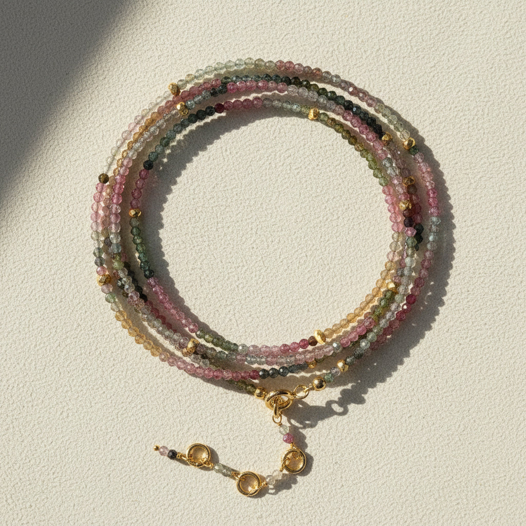 Multistrand tourmaline bead wrap bracelet/necklace with gold-tone toggle clasp and charm