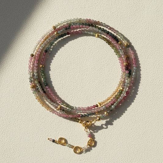 Multistrand tourmaline bead wrap bracelet/necklace with gold-tone toggle clasp and charm