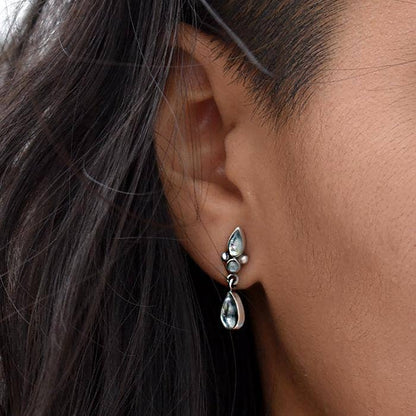 Silver drop earrings with blue-green teardrop stones