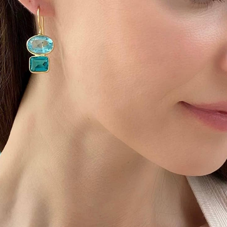 Teal-blue gemstone drop earrings with oval top and square bottom on hook