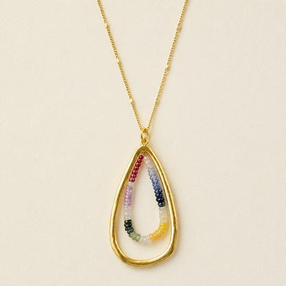 Gold teardrop necklace with multicolor sapphire-style bead pendant on chain