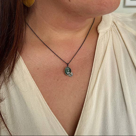 Silver chain necklace with oval dark teal gemstone guppy pendant