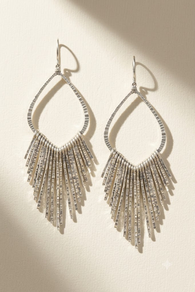Silver-tone teardrop fan earrings with dangling fringe and hook backs