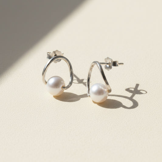 Silver-tone circle hoop earrings with white pearl drop studs